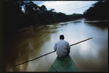 Guide at Twilight, Los Amigos River by Sam Abell at Les Yeux du Monde Gallery