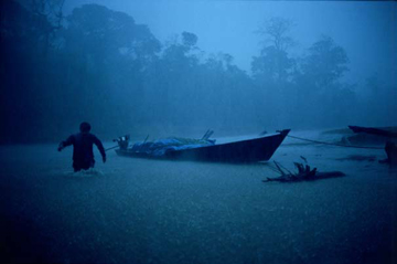 River Guide and Cargo during a Violent Thunderstorm, Heath River by Sam Abell at Les Yeux du Monde Gallery
